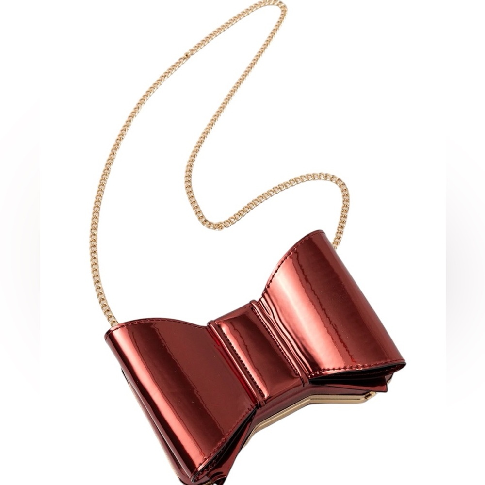 NWT ALDO Metallic Bow Bag Clutch with Crossbody Chain. Novelty. Secure closure